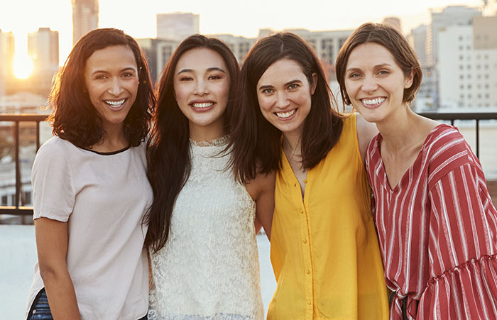 women-posing-skyline-700px.jpg